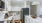 Styled apartment kitchen with white cabinets