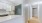 View of kitchen, hallway, and open closet