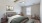 Styled apartment bedroom with vaulted ceiling