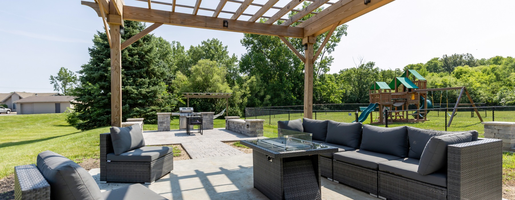 Pergola with furniture and firepit