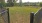 dog park with benches and a chain link fence
